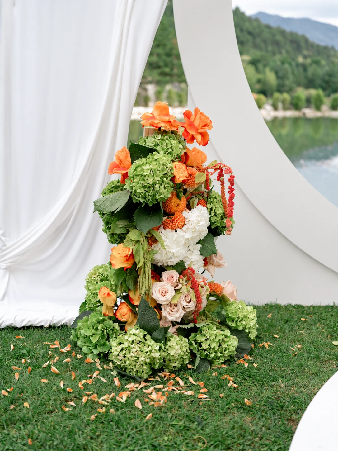 Outdoor ceremony flowers by the lake
