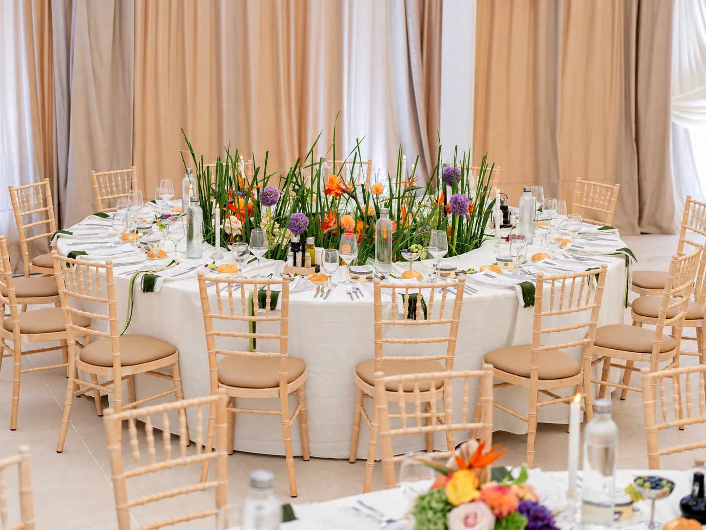 A decorated guest table in the wedding marquee